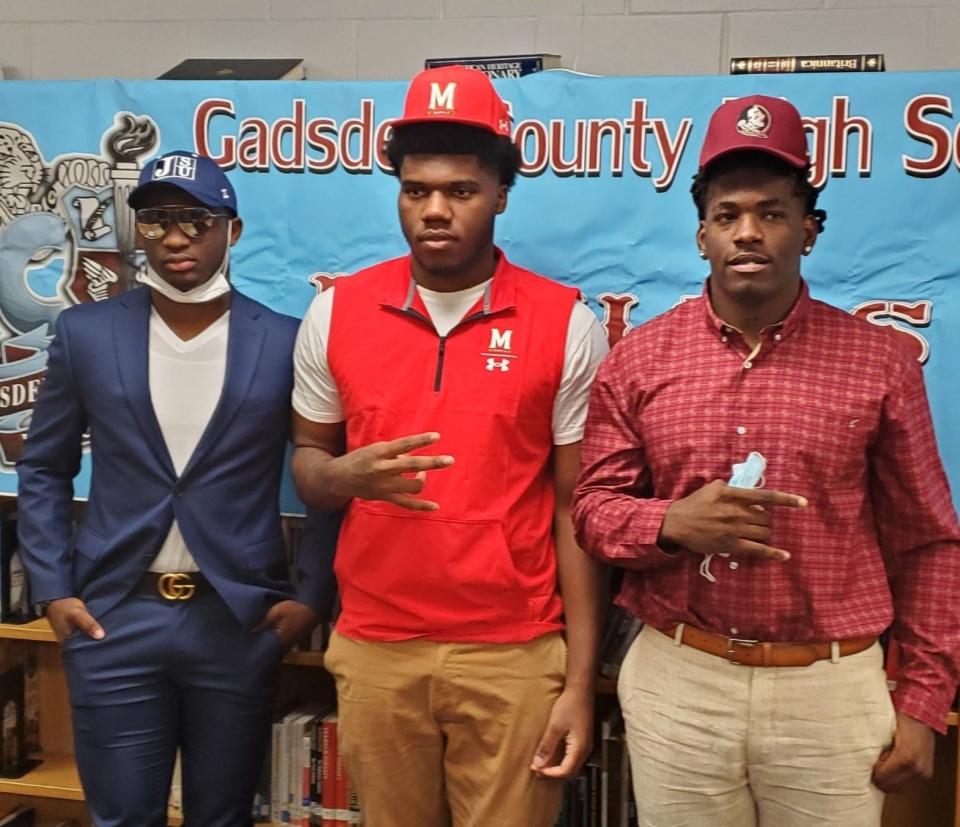 Gadsden County players Jeremiah Brown (left), Darrell Jackson and Joshua Farmer signed to Jackson State, Maryland and Florida State respectively on Wednesday, Dec. 16, 2020.