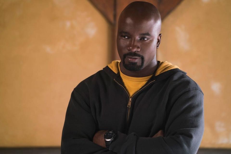 Luke Cage crosses him arms