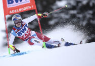 FILE - Switzerland's Marco Odermatt speeds down the course during an alpine ski, men's World Cup Giant slalom, in Adelboden, Switzerland, on Jan. 8, 2022. Looking for the Next Big Thing in Alpine skiing? Look no further than Marco Odermatt. The 24-year-old from Switzerland is a potential superstar who won five gold medals at the junior world championships in 2018 and is currently leading the overall World Cup standings. He’s a legitimate medal threat in three events at the upcoming Beijing Olympics with strong results in giant slalom, super-G and downhill this season. (AP Photo/Gabriele Facciotti, File)