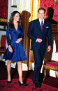 <p>The blue, satin Issa London wrap dress, which Kate wore for her engagement announcement in 2010, sold out in minutes online making it one lusted after royal wardrobe addition. <i>[Photo: PA Images]</i></p>