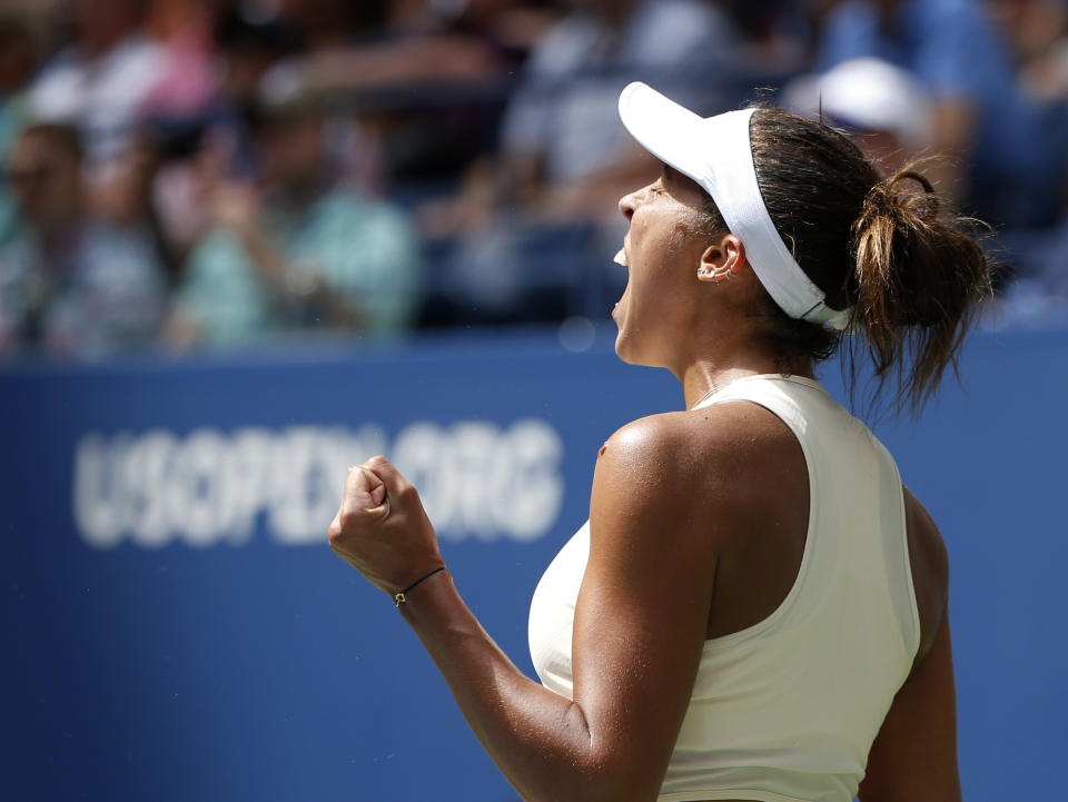 Madison Keys celebrates after defeating Aleksandra Krunic, of Serbia, during the third round of the U.S. Open tennis tournament, Saturday, Sept. 1, 2018, in New York. (AP Photo/Jason DeCrow)