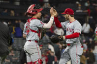 Los Angeles Angels' Logan O'Hoppe, left, celebrates with Taylor Ward, right, at the end of a baseball game against the Cleveland Guardians in Cleveland Friday, May 3, 2024. (AP Photo/Phil Long)