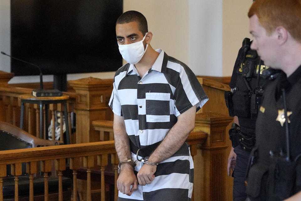 FILE - Hadi Matar, the man charged with stabbing author Salman Rushdie, arrives for an arraignment at the Chautauqua County Courthouse, Aug. 13, 2022, in Mayville, N.Y. Matar is not interested in an offered plea deal that would shorten his time in state prison but expose him to federal prison on a separate terrorism-related charge, his lawyer said Tuesday, June 18, 2024. (AP Photo/Gene J. Puskar, File)