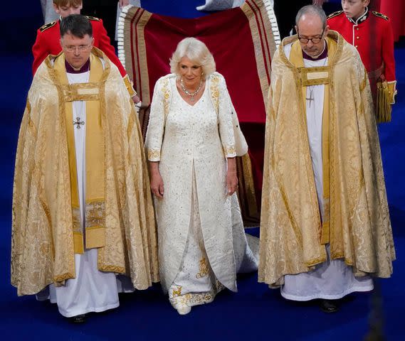 <p>Andrew Matthews - WPA Pool/Getty</p> Queen Camilla arrives for her coronation at Westminster Abbey on May 6, 2023.