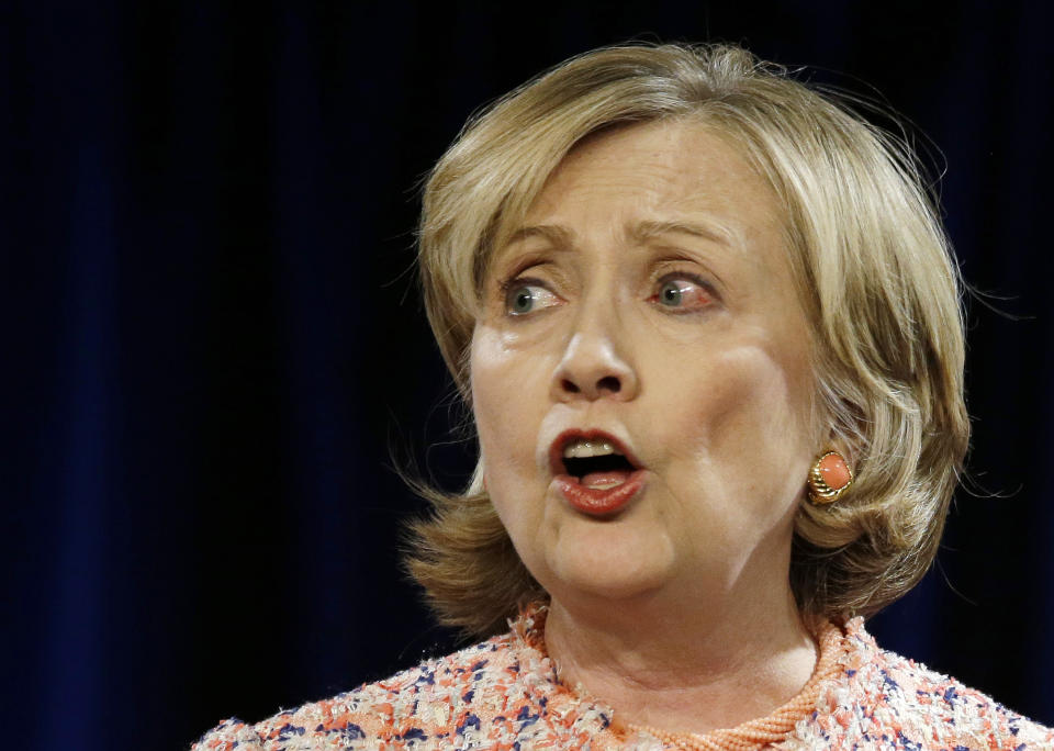 Former Secretary of State Hillary Rodham Clinton delivers her Simmons College Leadership Conference keynote address at the Seaport World Trade Center Wednesday, April 23, 2014, in Boston. (AP Photo/Stephan Savoia)