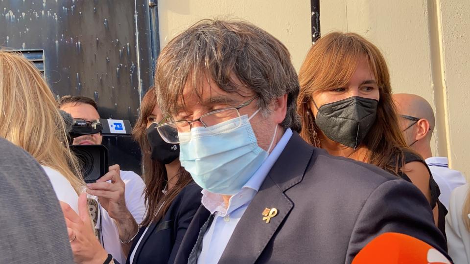 Catalan leader Carles Puigdemont, leaves the jail of Sassari, in Sardinia, Italy, Friday, Sept. 24, 2021. Puigdemont, sought by Spain for a failed 2017 secession bid, on Friday was released following a court hearing, ahead of an Italian court decision on Spain's extradition request, a day after Italian police detained him in Sardinia, an Italian island with strong Catalan cultural roots and its own independence movement. (AP Photo/Gloria Calvi)