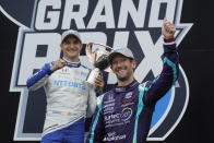 Romain Grosjean, of Switzerland, waves to fans after finishing second during the IndyCar auto race at Indianapolis Motor Speedway, Saturday, May 15, 2021, in Indianapolis. (AP Photo/Darron Cummings)