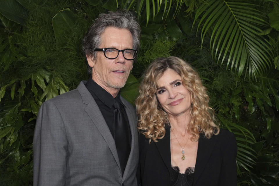 Kevin Bacon, left, and Kyra Sedgwick arrive at 14th annual Pre-Oscar Awards Dinner on Saturday, March 11, 2023, at the Beverly Hills Hotel in Beverly Hills, Calif. (Photo by Jordan Strauss/Invision/AP)