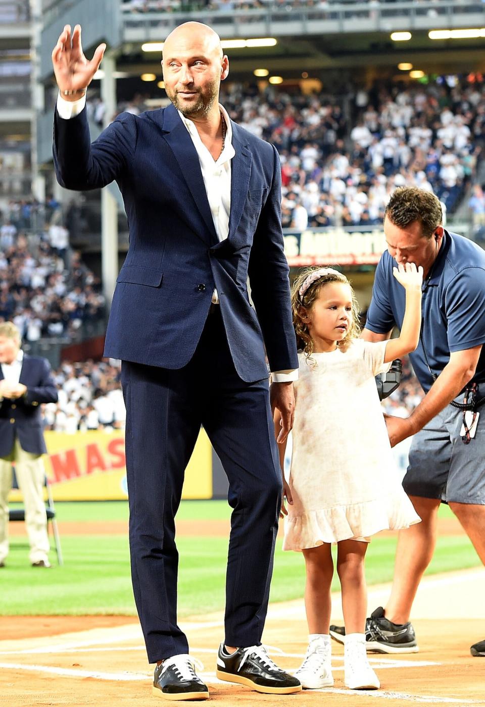 The New York Yankees held a Derek Jeter "Hall Of Fame Night" at Yankee Stadium on September 9, 2022 . In attendance where Derek Jeters' wife Hannah, daughters Story, Bella and River Rose , his Mom Dorothy and father Charles as well as former Yankee teammates . Pictured: Derek Jeter and daughter Ref: SPL5432332 100922 NON-EXCLUSIVE Picture by: Jackie Brown / SplashNews.com Splash News and Pictures USA: +1 310-525-5808 London: +44 (0)20 8126 1009 Berlin: +49 175 3764 166 photodesk@splashnews.com World Rights,