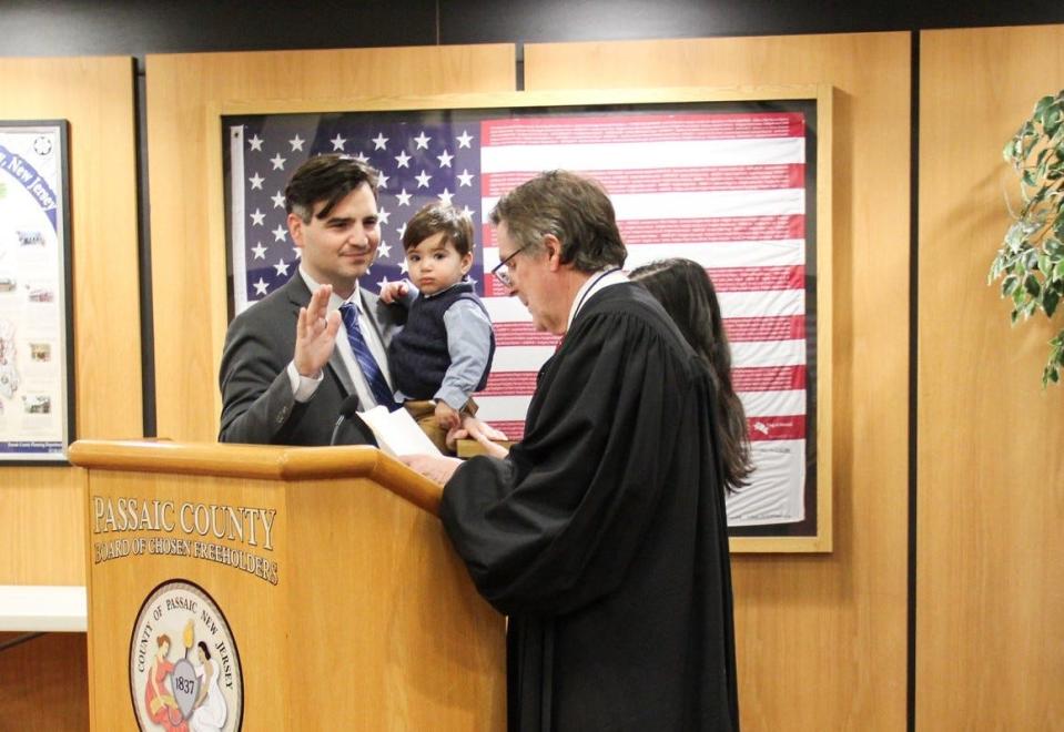 Passaic County Counsel Matthew Jordan takes his oath of office in January 2020.