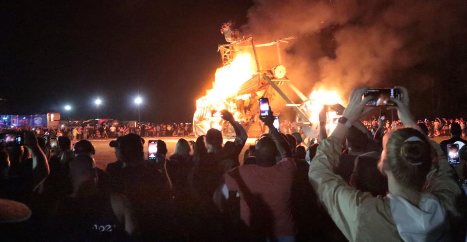 The crowd cheers as the flames grow higher on the Burning Bike, a giant 75-foot wooden bike and rider during last year's Bike Week. The annual Burning Bike ceremony will return March 8 at the Volusia County Fairgrounds in DeLand.