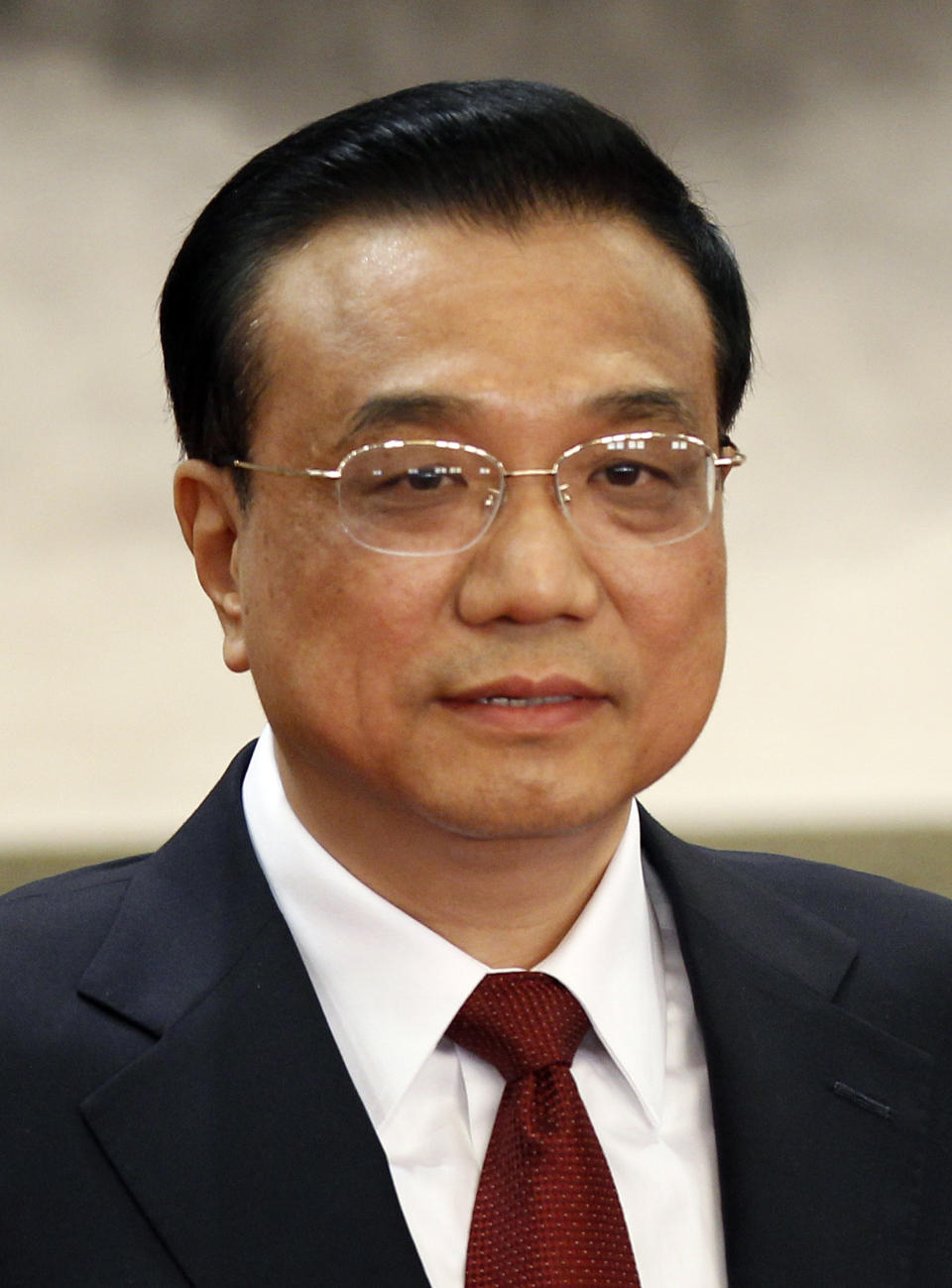 Li Keqiang, one of the seven newly elected members of the Politburo Standing Committee, attends a press event at Beijing's Great Hall of the People, Thursday Nov. 15, 2012. The seven-member Standing Committee, the inner circle of Chinese political power, was paraded in front of assembled media on the first day following the end of the 18th Communist Party Congress. (AP Photo/Vincent Yu)