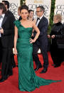 At the 2011 Golden Globes, where she was nominated for her role in the ballet drama, Kunis hit the red carpet in an assymmetrical Vera Wang gown in a flattering shade of green that showed just enough skin. While she didn't take home the trophy, the actress — who wore her hair up in a French twist — landed on many best dressed lists. (1/16/2011)