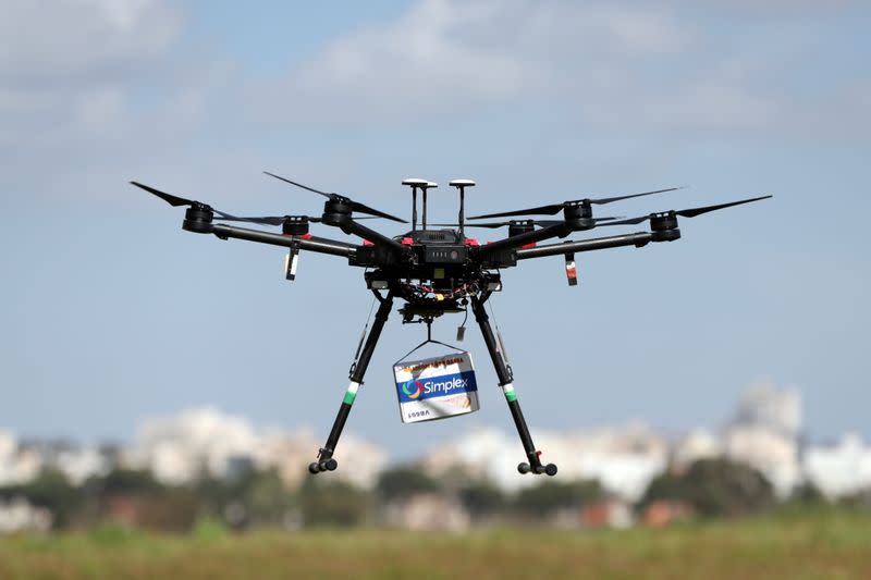 A delivery drone is seen midair during a demonstration whereby drones from various companies flew in a joint airspace and were managed by an autonomous control system in Haifa, near Hadera
