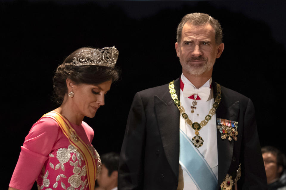 Spain's King Felipe and his wife Queen Letizia arrive at the Imperial Palace for the court banquet after the enthronement ceremony of Emperor Naruhito in Tokyo Tuesday, Oct. 22, 2019. (Pierre-Emmanuel Deletree/Pool Photo via AP)