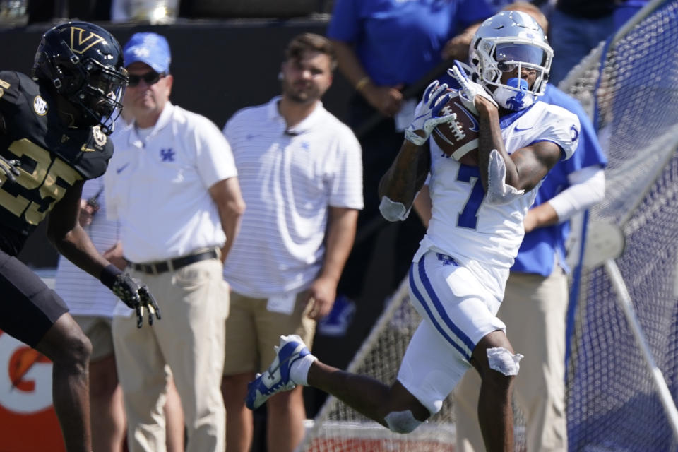 Kentucky wide receiver Barion Brown (7) makes a first down catch past Vanderbilt cornerback Martel Hight (25) in the first half of an NCAA college football game Saturday, Sept. 23, 2023, in Nashville, Tenn. (AP Photo/George Walker IV)