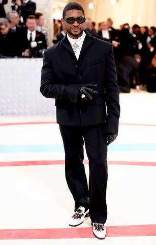 <p>John Shearer/WireImage</p> Usher at the 2023 Met Gala in May in New York City