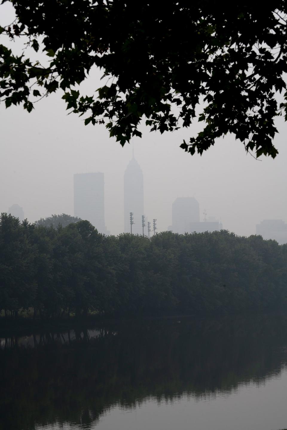 A haze covers Indianapolis, Wednesday, June 28, 2023 as seen from White River Pkwy across White River. Air quality in Central Indiana is being impacted by Canadian wildfires. 