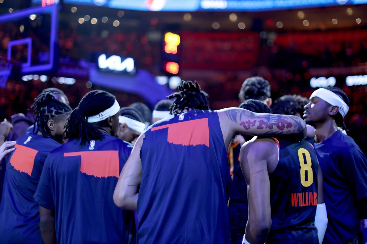 Thunder players huddle before Sunday's regular-season finale against Mavericks at Paycom Center. OKC will face the No. 8 seed in the first round of the playoffs, starting Sunday.