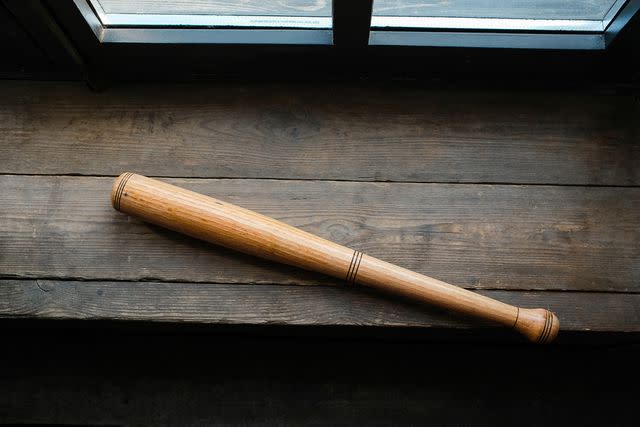 <p>Getty</p> A wooden baseball bat