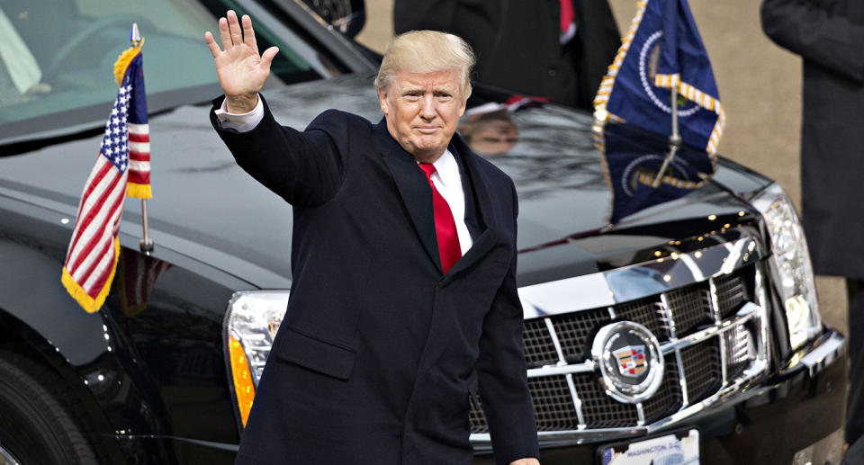 FILE: U.S. President Donald Trump waves while walking near the White House during the 58th presidential inauguration parade in Washington, D.C., U.S., on Friday, Jan. 20, 2017. President Donald Trump says he wont attend President-elect Joe Bidens inauguration next week after Trump supporters mounted a violent assault on the U.S. the capitol. Trumps decision to skip the ceremony is a notable break from recent precedent as we look back on Trumps own inauguration 4 years ago on the 20th Jan, 2017. Photographer: Daniel Acker/Bloomberg via Getty Images