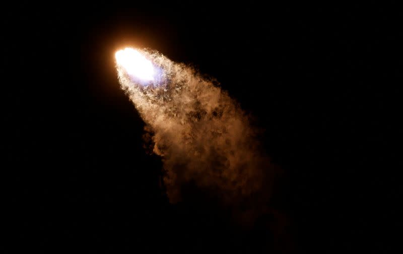 The U.S. military's secretive X-37B robot spaceplane lifts off atop a SpaceX Falcon Heavy rocket