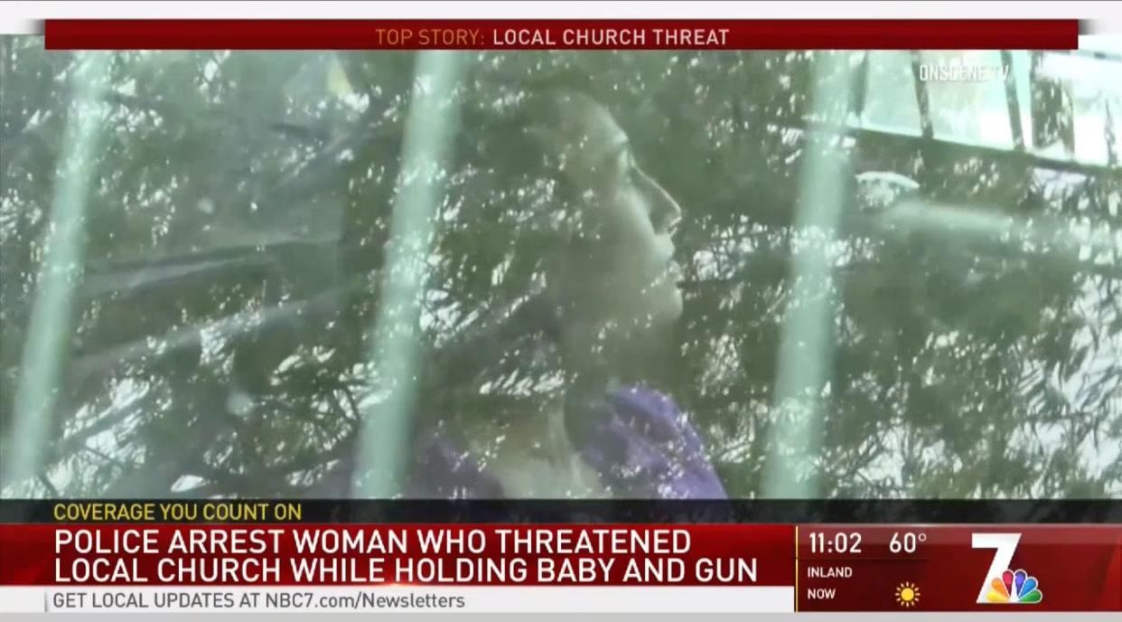 Anna Conkey, 31, arrested after bursting into church with her baby and a gun in hand. (Photo: KNSD)