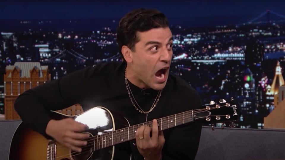 Oscar Isaac playing the guitar and singing The Hippotamus Song