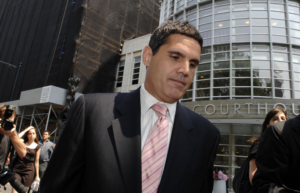 FILE - Attorney John Lauro exits Brooklyn federal court following a news conference on Aug. 15, 2007, in New York. Former President Donald Trump and his legal team face long odds in their bid to move his 2020 election conspiracy trial out of Washington. They argue the Republican former president can’t possibly get a fair trial in the overwhelmingly Democratic nation’s capital. (AP Photo/ Louis Lanzano, File)