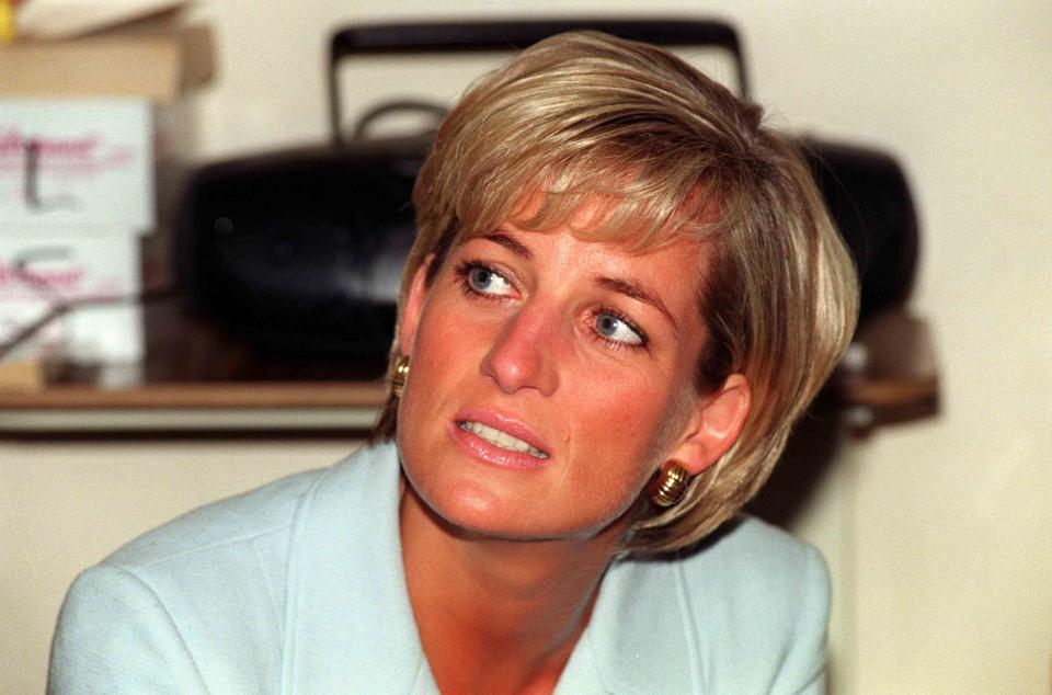 <p>Neil Munns - PA Images/PA Images via Getty</p> Princess Diana in London in April 1997