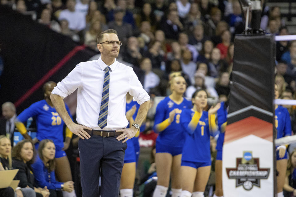 Pittsburgh head coach Dan Fisher watches the action against Louisville during the semifinals of the NCAA volleyball tournament, Thursday, Dec. 15, 2022 in Omaha, Neb. (AP Photo/John S. Peterson)