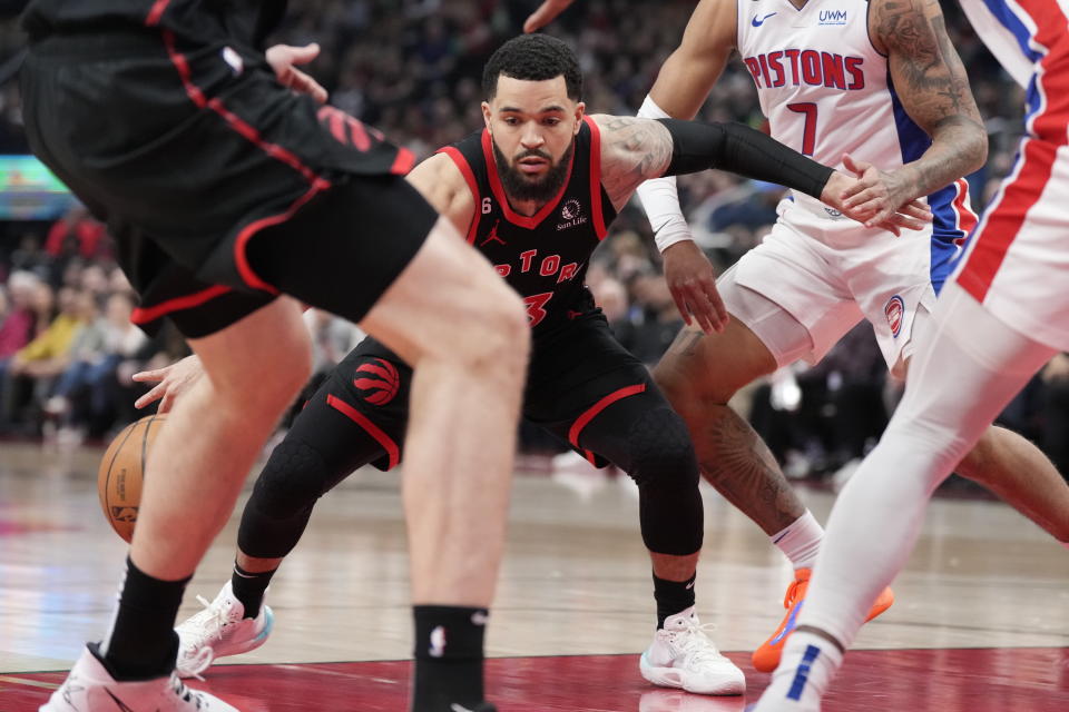 Toronto Raptors guard Fred VanVleet (23) controls the ball as he moves around Detroit Pistons guard Killian Hayes (7) during the first half of an NBA basketball game Friday, March 24, 2023, in Toronto. (Frank Gunn/The Canadian Press via AP)