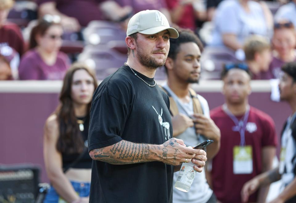 Sep 16, 2023; College Station, Texas, USA; Former Texas A&M Aggies player Johnny Manziel watches from the sideline during the first half of the game between the Aggies and the Louisiana Monroe Warhawks at Kyle Field. Mandatory Credit: Troy Taormina-USA TODAY Sports