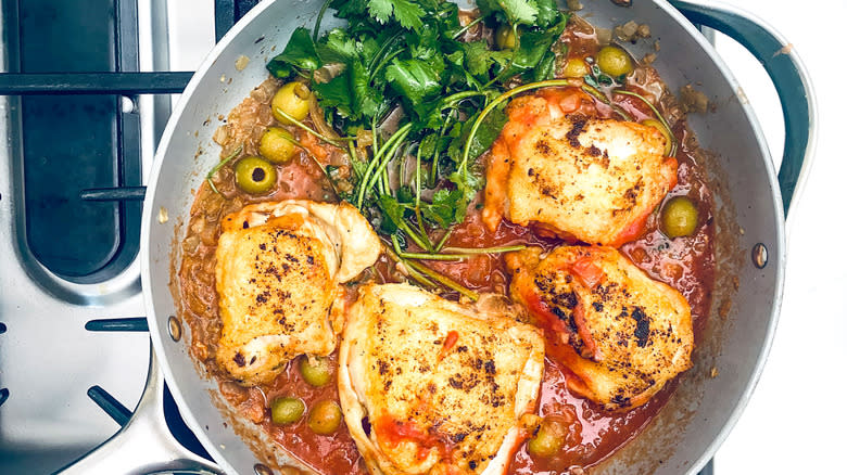 simmering chicken fricassee in pan