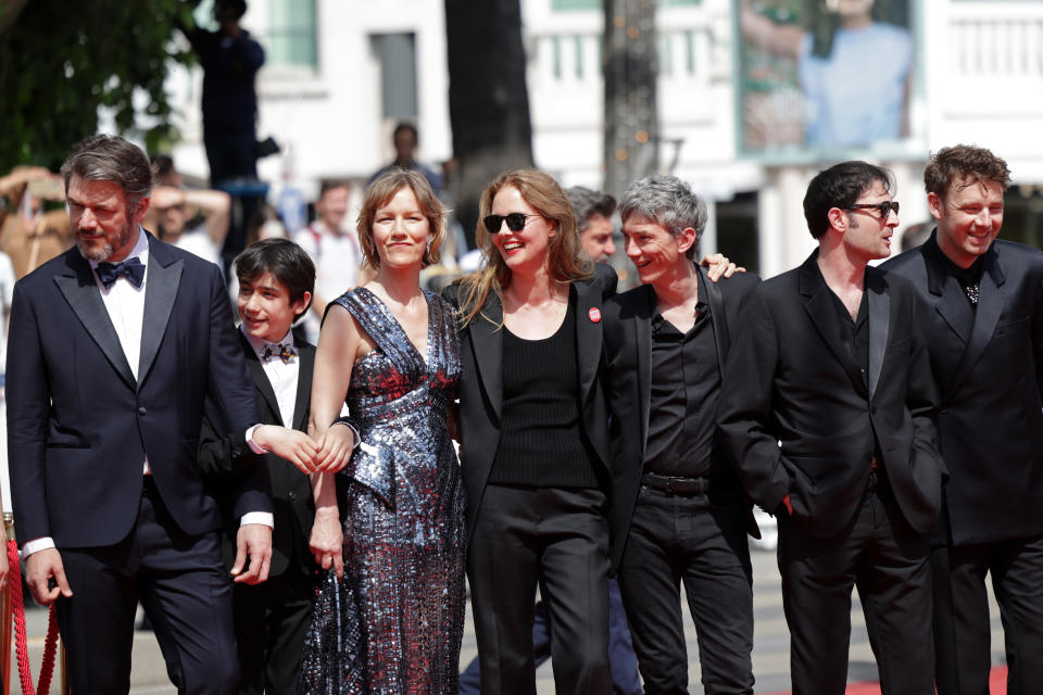 Justine Triet with a ‘Sous les écrans la dèche’ pin at last year’s Cannes Film Festival (Photo by Pascal Le Segretain/Getty Images).