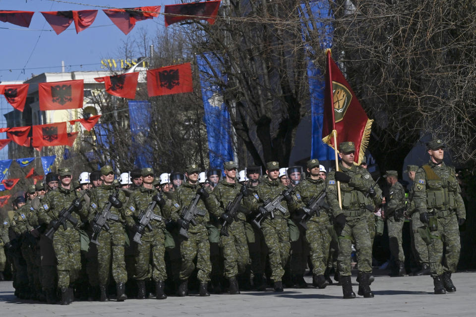 FILE - Kosovo Security Force members march during celebrations to mark the 15th anniversary of independence, in Pristina, Kosovo, Friday, Feb. 17, 2023. The leaders of Serbia and Kosovo are holding talks Monday on European Union proposals aimed at ending a long series of political crises and setting the two on the path to better relations and ultimately mutual recognition. (AP Photo, File)