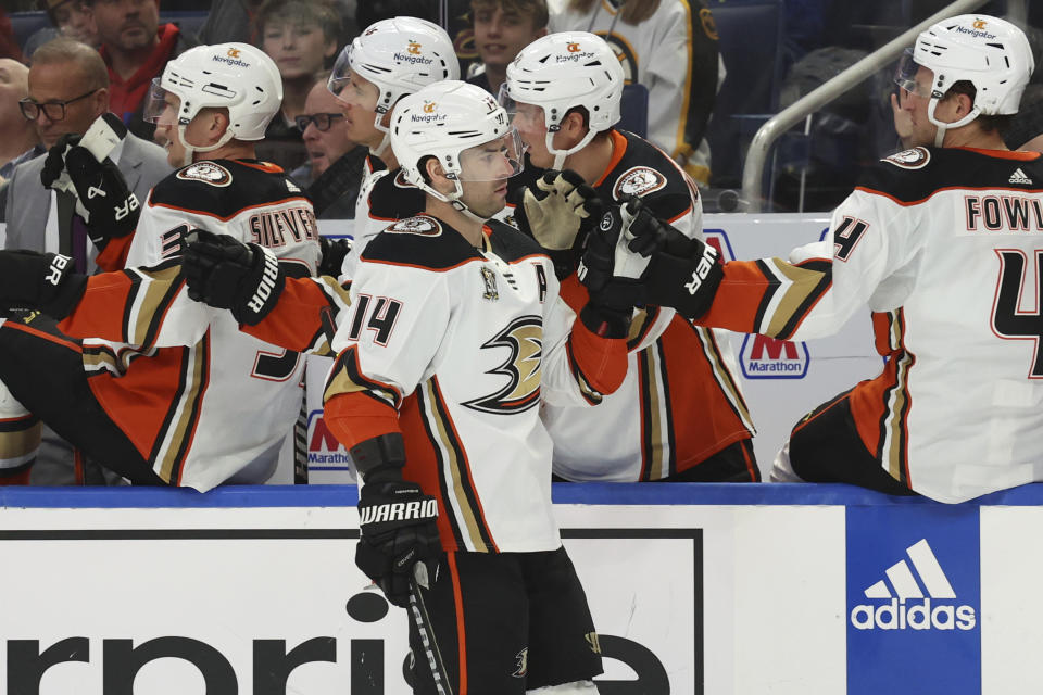 Anaheim Ducks center Adam Henrique (14) celebrates his goal during the first period of an NHL hockey game against the Buffalo Sabres Monday, Feb. 19, 2024, in Buffalo, N.Y. (AP Photo/Jeffrey T. Barnes)