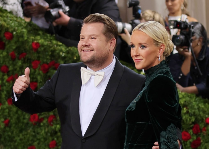 A closeup of James Corden and Julia Carey