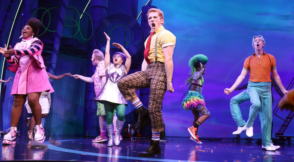 the cast of spongebob the musical dancing onstage