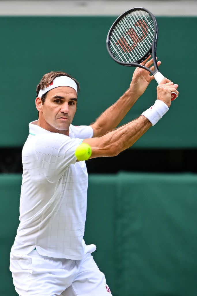 london, england   july 07 roger federer of switzerland hits a backhand against hubert hurkacz of poland in the quarter finals of the gentlemens singles during day nine of the championships   wimbledon 2021 at all england lawn tennis and croquet club on july 07, 2021 in london, england photo by tpngetty images