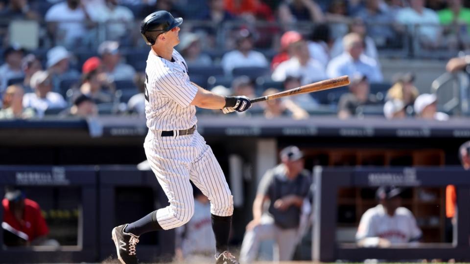 Jun 26, 2022;  Bronx, New York, USA;  New York Yankees third baseman DJ LeMahieu follows through on a game tying two run home run against the Houston Astros during the eighth inning at Yankee Stadium.