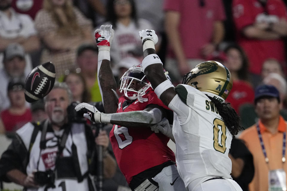 UAB safety Keondre Swoopes (0) is called for pass interference as he breaks up a pass intended for Georgia wide receiver Dominic Lovett (6) during the first half of an NCAA college football game, Saturday, Sept. 23, 2023, in Athens, Ga. (AP Photo/John Bazemore)