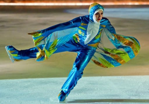 This photo, made avilable by Zayed Sports City in Abu Dhabi, shows Emirati Zahra Lari, 17, training at Zayed skates arena. The 17-year-old not only became the first figure skater from the Gulf to compete in an international competition but the first to do so wearing the hijab, an Islamic headscarf