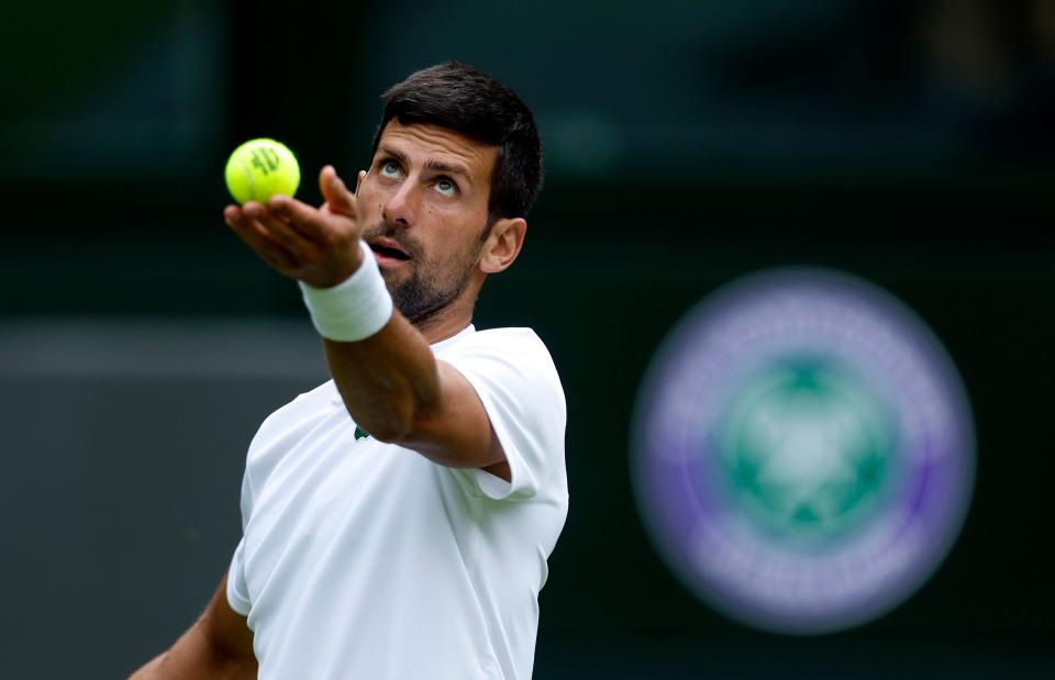 Novak Djokovic practices on Center Court ahead of the 2022 Wimbledon Championship.