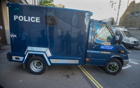 A police van believed to be carrying Ahmed Hassan leaves Westminster magistrates court after he was charged with attempted murder - Credit: Julian Simmonds for the Telegraph