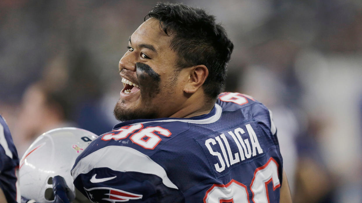 Mandatory Credit: Photo by Tim Sharp/AP/REX/Shutterstock (9271216ak)New England Patriots' Sealver Siliga on the sideline during the second half of an NFL football game against the Dallas Cowboys, in Arlington, TexasPatriots Cowboys Football, Arlington, USA - 11 Oct 2015.