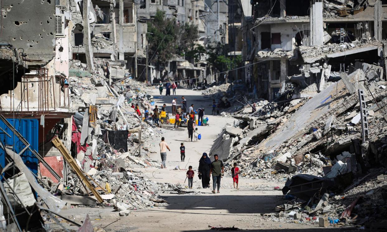 <span>Displaced Palestinians in Khan Younis, southern Gaza, in May. The Palestinian territories were the sixth-largest source of onshore applications for protection in Australia that month.</span><span>Photograph: AFP/Getty Images</span>