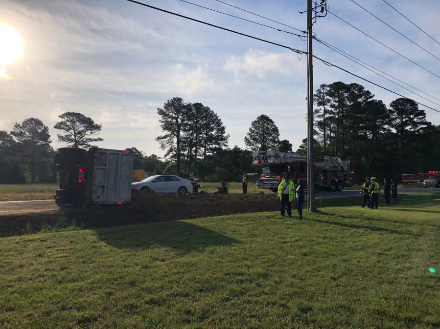 A dump truck and a box overturned in this four-vehicle crash on Friday in Suffolk (Courtesy of City of Suffolk)