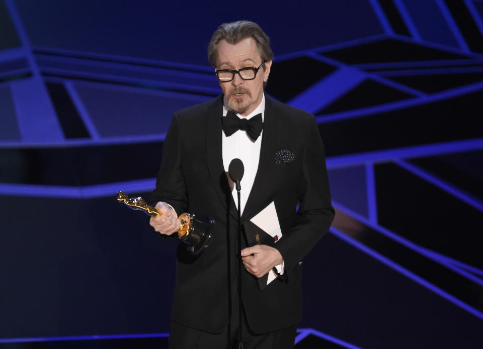 Gary Oldman accepts the award for best performance by an actor in a leading role for “Darkest Hour” at the Oscars on Sunday, March 4, 2018, at the Dolby Theatre in Los Angeles. (Photo by Chris Pizzello/Invision/AP)