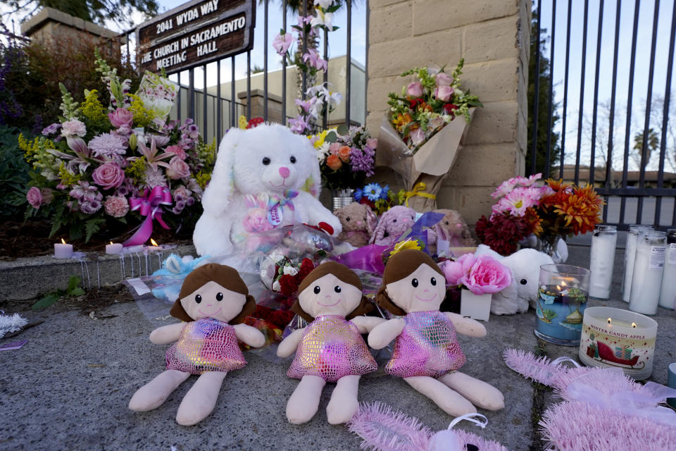 FILE - A memorial for the three young girls, who were slain by their father, David Mora, is seen outside The Church in Sacramento in Sacramento Calif., on Tuesday, March 1, 2022. Immigration officials told the Associated Press, Friday, March 4, 2022, that Mora had overstayed his visa after entering California from Mexico in December 2018 and was in the United States illegally. Mora, 39, who was under a restraining order and was not supposed to have a gun, when he fatally shot his three daughters, a chaperone and himself on Monday during a supervised visit with the girls. (AP Photo/Rich Pedroncelli, File)